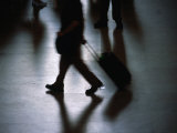 Commuter Wheeling Luggage in Concourse of Grand Central Terminal, New York City, New York, USA Photographie par Angus Oborn