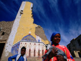 Woman Holding a Kid Goat at a Luxor Village, Luxor, Egypt Photographic Print by Izzet Keribar