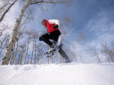 Man Running in Snowshoes Photographic Print by Jack Affleck