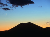 Crescent Moon Rising Over Old Volcano, NM Photographic Print by Kevin Leigh