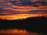 Sunset is Reflected in the Mackenzie River Photographic Print by Raymond Gehman