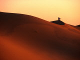 Couple on Dunes in the Erg Oriental Sand Sea, Ghadhames, Libya Photographic Print by Doug McKinlay