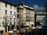 Market and Buildings in City Street, Coimbra, Portugal Photographic Print by Bethune Carmichael