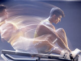 Man Using Rowing Machine Photographic Print by Daniel Fort