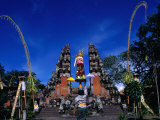 Worshipper Bringing Offering to Pura Pentaran Sasih in Pejang, Bali, Indonesia Photographic Print by Bill Wassman