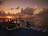 Sunset and Jet Skis, Cancun, Mexico Photographic Print by Walter Bibikow