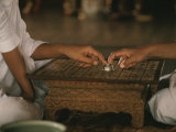 A Thai Fortune Teller Predicts the Future for a Client Photographie par W. E. Garrett