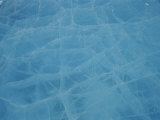 A Thick Piece of Ice Reflects Blue Light from its Cracked Surface Photographic Print by Norbert Rosing