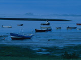 Small Fishing Boats Line the Shore at the North End of Lindisfarne Photographic Print by Sisse Brimberg