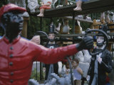 A Curious Mixture of Lawn Ornaments Includes Lincolns and Jockeys Photographic Print by Stephen St. John