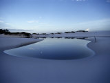 A White Sand Dune with a Pool of Water Reflecting the Sky Photographic Print by Sam Abell