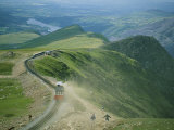A Train Carrying Tourists Chugs up Snowdon Mountain in Wales Photographic Print by Joel Sartore