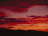 Twilight View of a Landscape with Clouds Photographic Print by Kenneth Garrett
