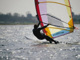 A Windsurfer Catches a Ride off the Coast of Massachusetts Photographic Print by Tim Laman