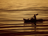 Person in Boat in Water Photographic Print by Lee Peterson