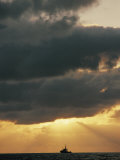 The Sun Shines Through the Clouds over the Atlantic Ocean Photographic Print by Emory Kristof