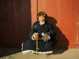 A Man Sits in the Sun in Ulaanbaatar, Mongolia Photographie par Ed George