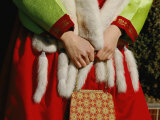 A Woman in a Fur Stole Holding a Purse Photographie par Paul Chesley