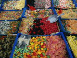 Inviting Arrays of Multi-Colored Candies in the Plaza De Catalonia Photographic Print by Stephen St. John