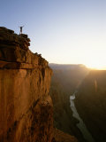 A Hiker Surveys the Grand Canyon from Atop Toroweap Overlook Photographic Print by John Burcham