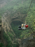 A Biologist Ascends Tawi Attair, a 200-Meter Deep Sinkhole Photographic Print by Stephen Alvarez