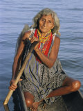 A Warao Indian in a Canoe Photographic Print by Ed George