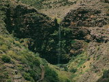 Waterfall Coursing over a Heart-Shaped Rock Formation Photographie par Walter Meayers Edwards