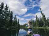 A Man Fishing in the River Photographie par Barry Tessman