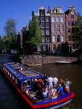 Canal Sightseeing Boat, Amsterdam, Netherlands Photographic Print by Wayne Walton