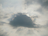 Sun Behind Clouds Photographic Print by Medford Taylor