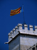 Flag Flies Over the 15th Century Lonja Silk and Commodity Market, Valencia, Spain Photographie par Johnson Dennis