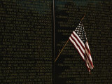 American Flag Left at the Vietnam Veterans Memorial Photographic Print