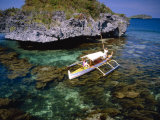 Bangka with Female Passenger on Clear Water, Hundred Islands National Park, Pangasinan, Philippines Photographic Print by John Pennock