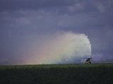 A Farmer Irrigating His Fields Photographic Print