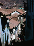 Steep and Narrow Hatunrumiyoc Street, with La Merced Tower in Distance, Cuzco, Peru Photographie par Richard I'Anson