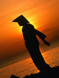 Silhouette of Woman Exercising on Beach at Sunset, Nha Trang, Khanh Hoa, Vietnam Photographic Print by John Banagan