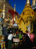 People at Shrine at Shwedagon Pagoda, Yangon, Myanmar (Burma) Photographic Print by Bill Wassman