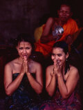 Monk Blessing Two Women at Angkor Wat, Angkor, Cambodia Photographic Print by Michael Coyne