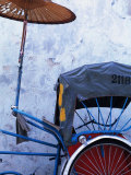 Detail of Rickshaw Leaning Against Wall on Cintra Street, Georgetown, Malaysia Photographic Print by Tom Cockrem