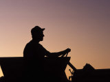 Man Driving a Tractor Photographic Print