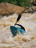 Kayaker Paddles Through Colorado River Rapids Photographic Print by Mark Cosslett