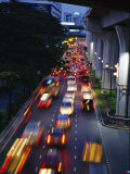 Evening Traffic on a Bangkok Street Photographie par Richard Nowitz