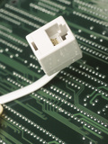 Telephone Jack on Computer Processor Lámina fotográfica