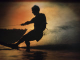Silhouette of a Man Water Skiing Photographic Print