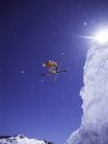 Low Angle View of a Skier in Mid Air Photographic Print