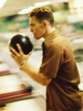 Side Profile of a Young Man Holding a Bowling Ball Photographic Print