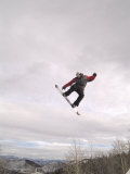 Airborne Snowboarder Lámina fotográfica