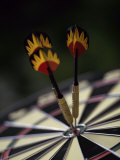 Two Darts on the Bull's-Eye of a Dart Board Photographic Print