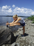 Blond Woman Stretching Photographic Print