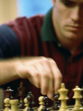 Chess Player Contemplating a Move Lámina fotográfica Chess Player Contemplating a Move Lámina fotográfica
